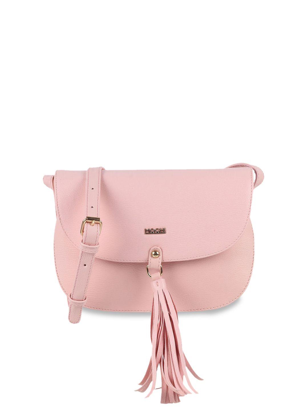 mochi textured structured sling bag with tasselled
