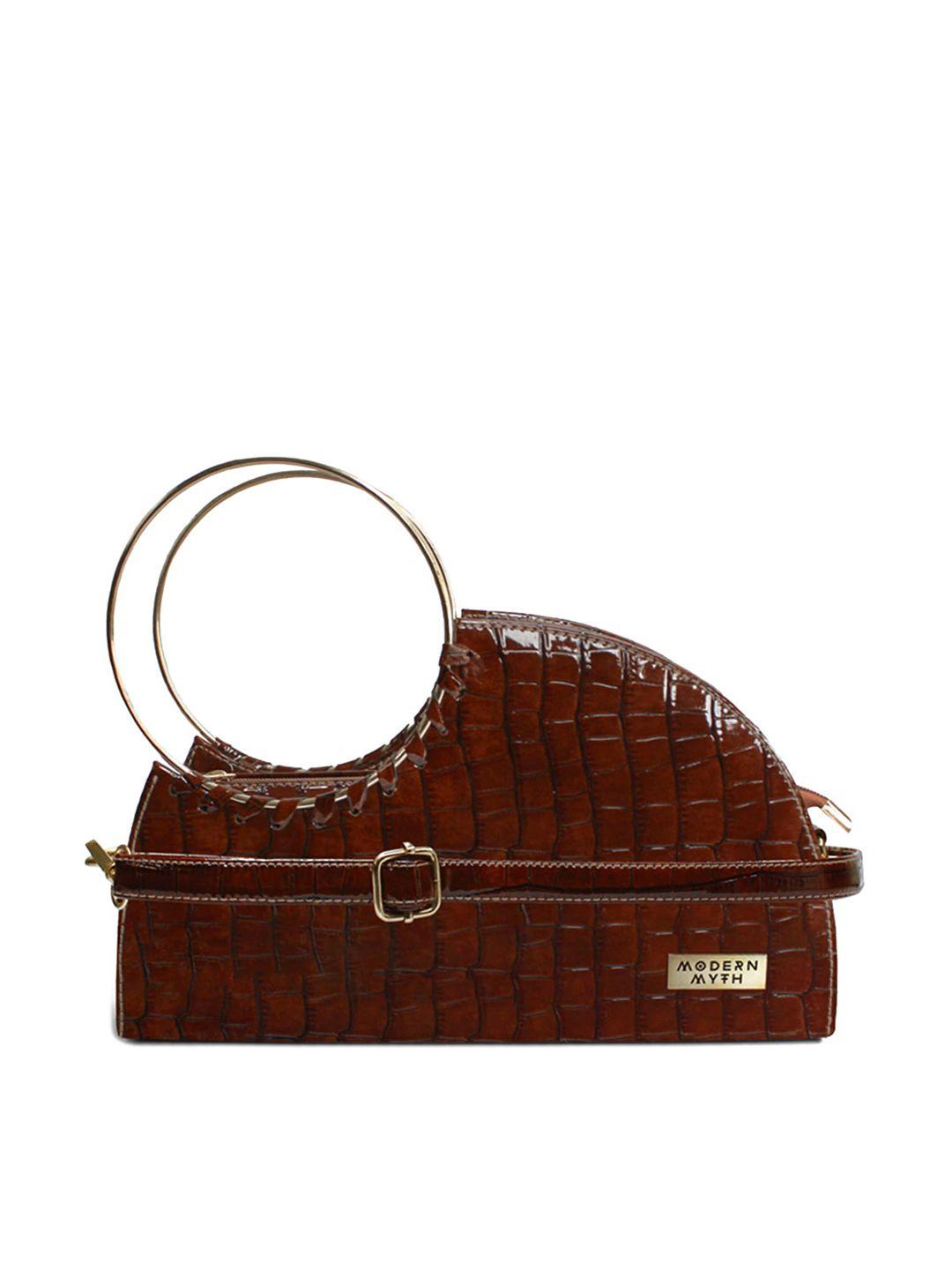 modern myth textured structured handheld bag with tasselled