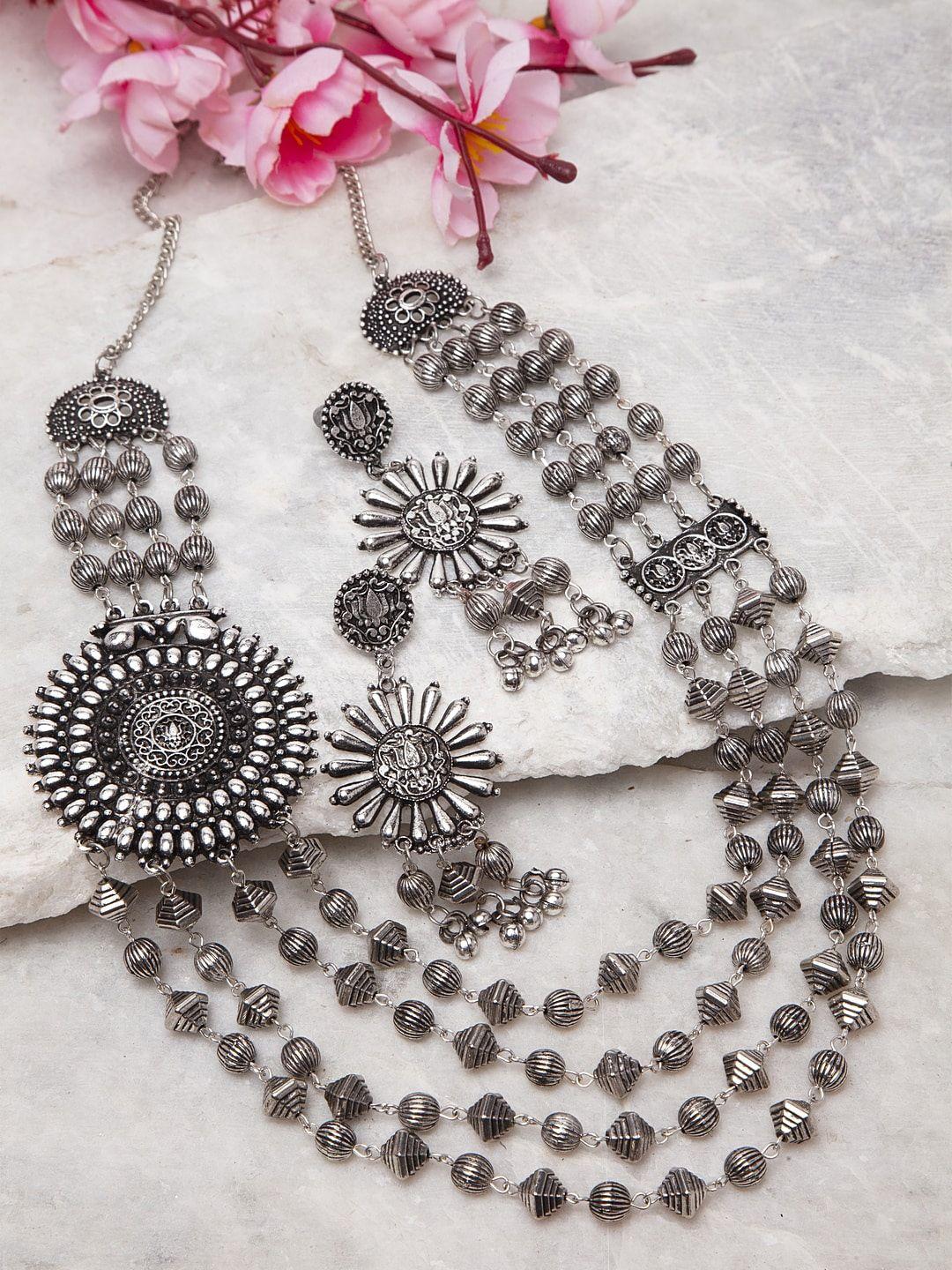 moedbuille silver-toned layered tasselled design tribal bohemian look temple jewellery set