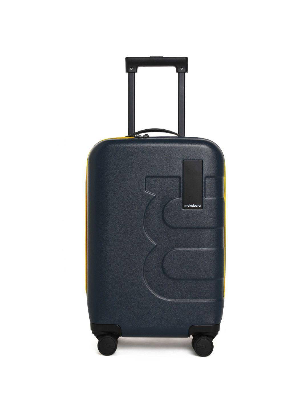 mokobara the em textured hard-sided small trolley suitcase