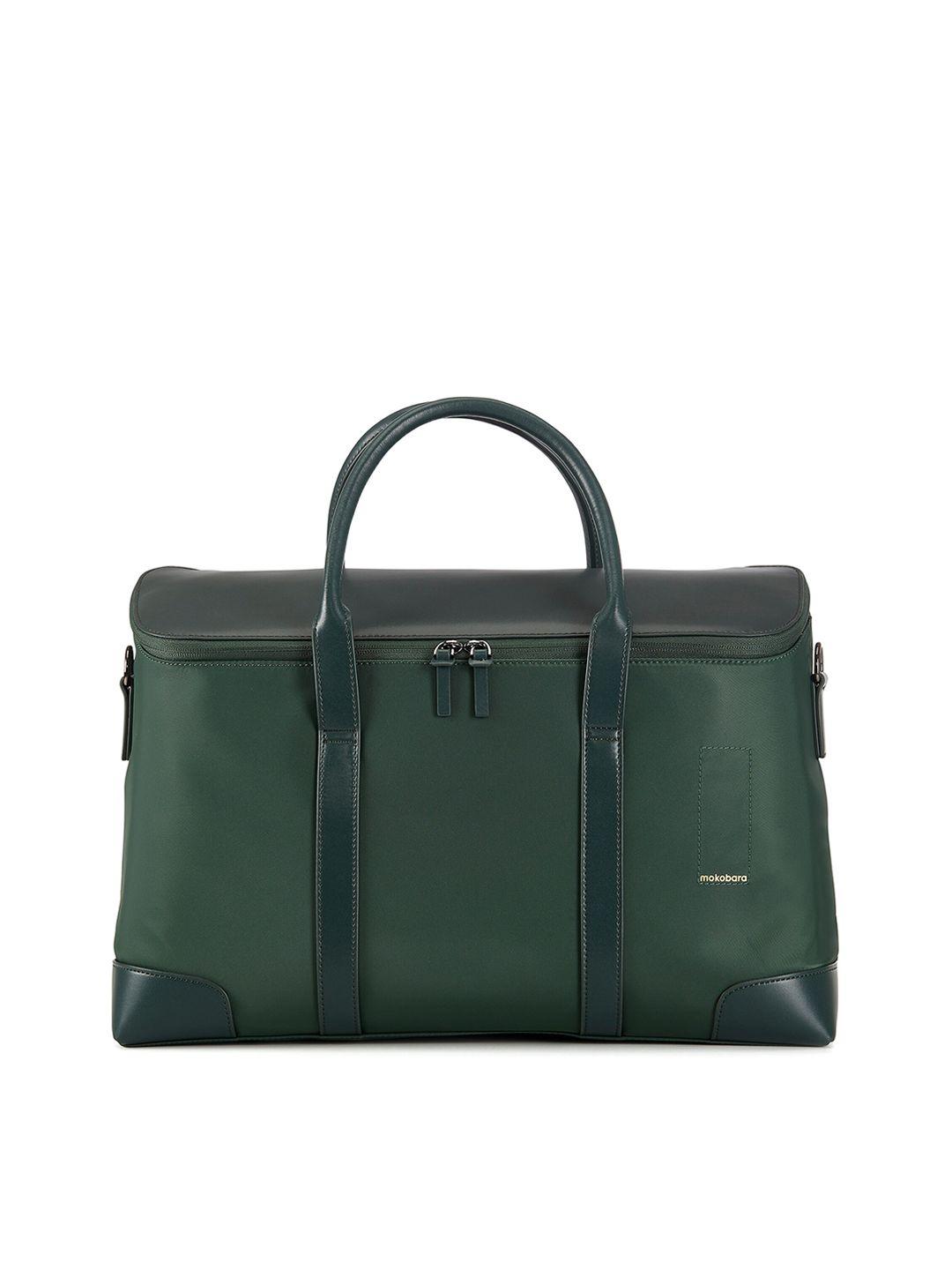 mokobara unisex green solid leather duffel bag