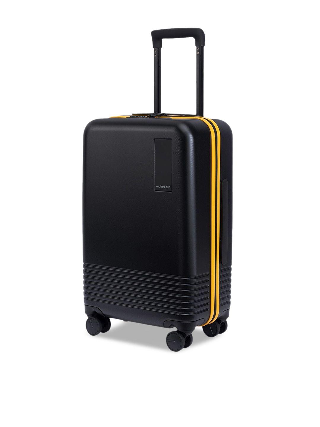 mokobara black & yellow textured medium cabin trolley bag