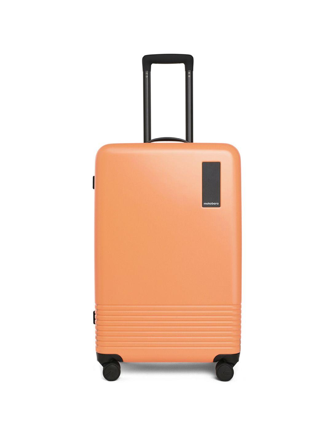 mokobara hard-sided medium trolley suitcase