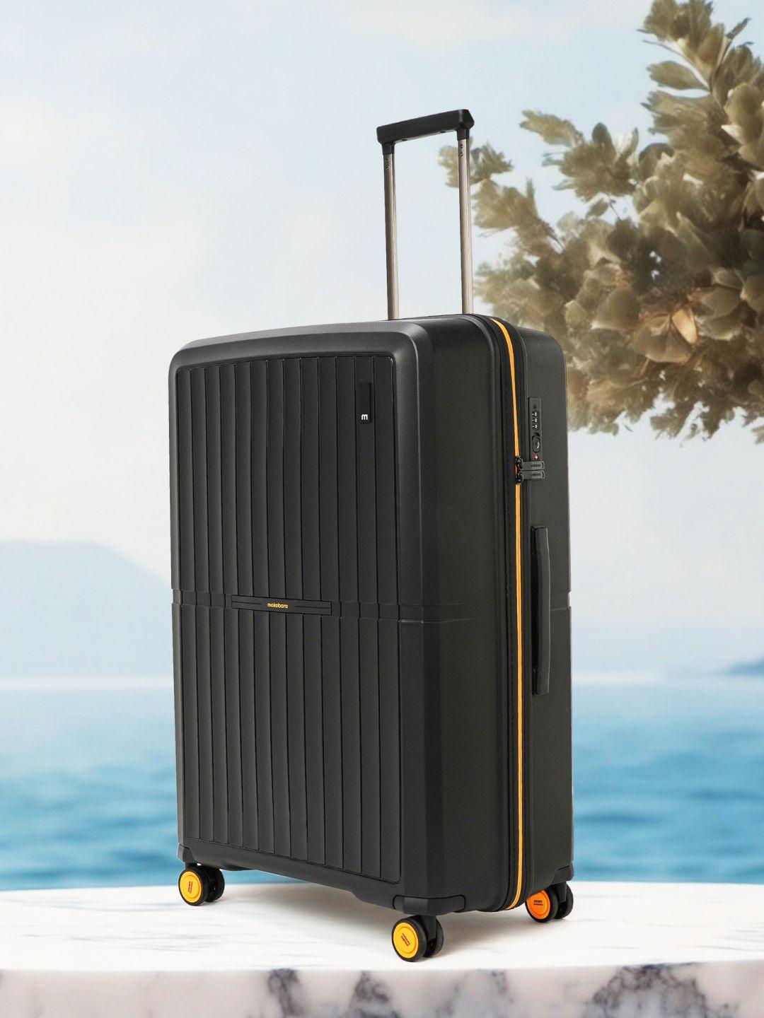 mokobara textured hard-sided large suitcase trolley bag 125.30 l