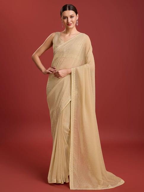 monjolika fashion beige embellished saree with blouse