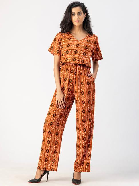 moomaya orange printed jumpsuit