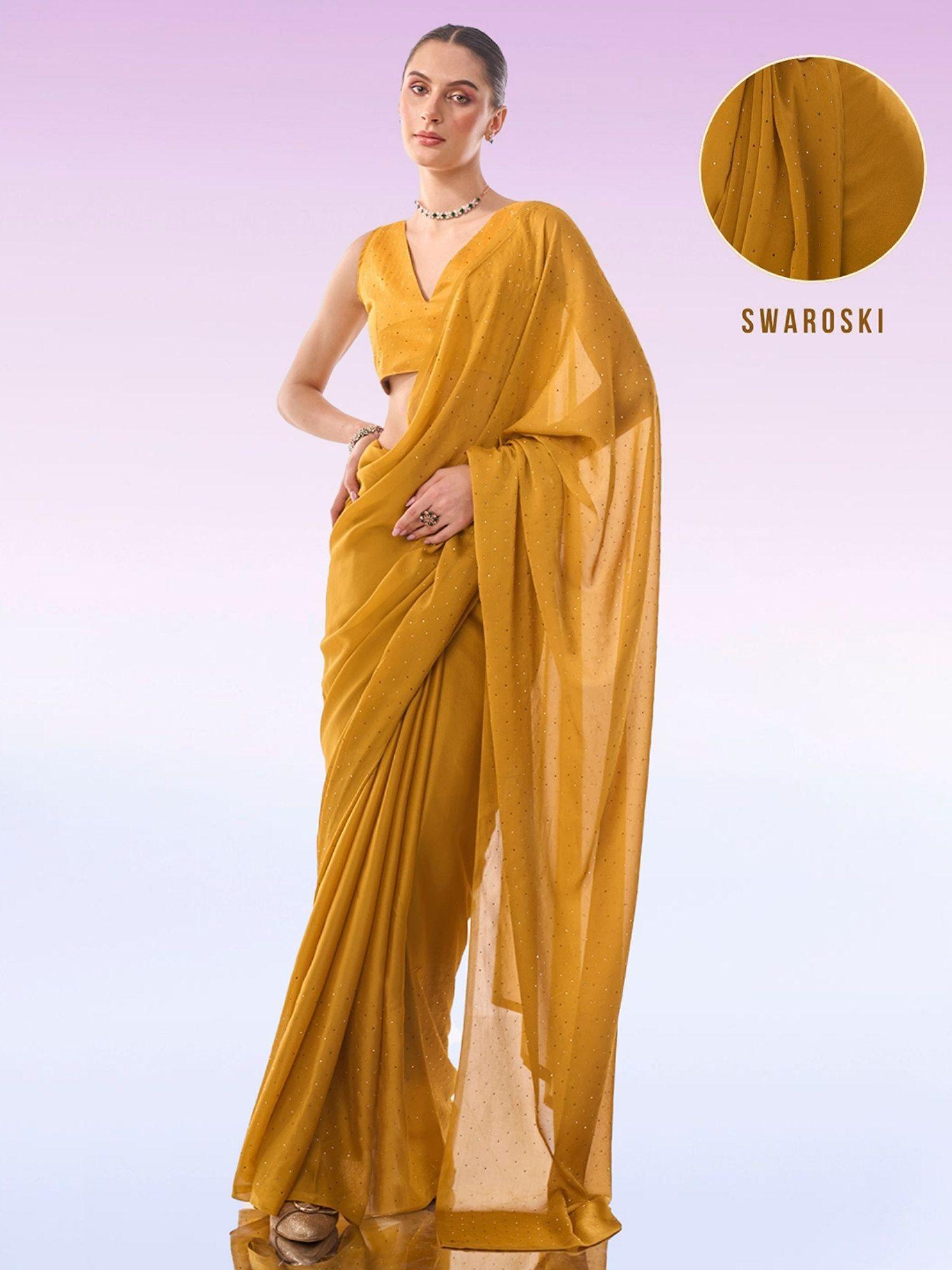 mordern stone work solid georgette embellished mustard saree & unstitched blouse