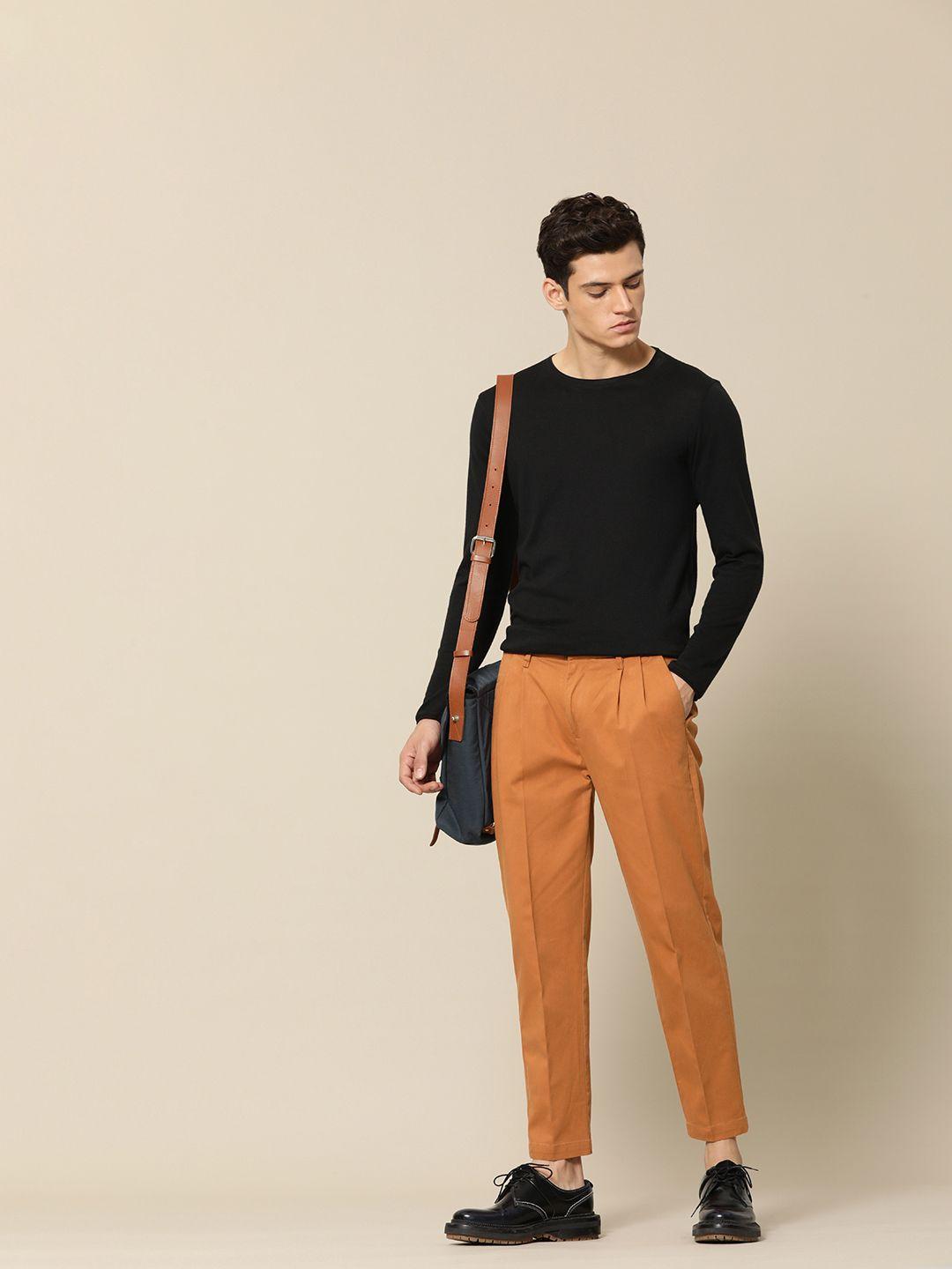 mr bowerbird men rust orange solid liberal fit double pleated trousers