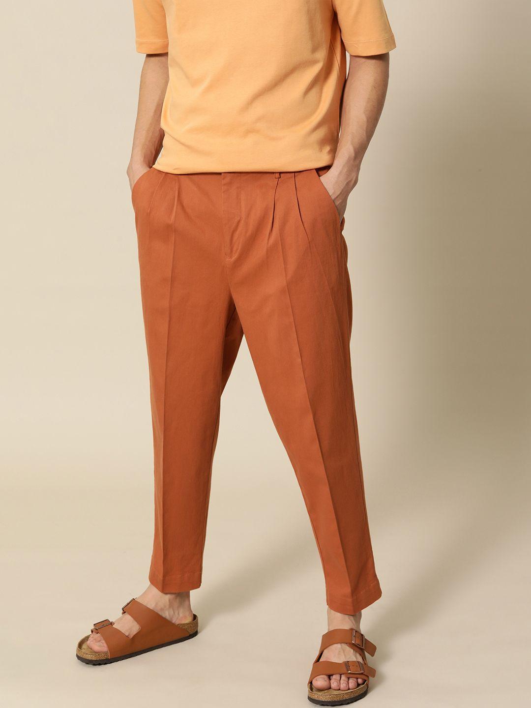 mr bowerbird men rust brown oversized fit mid-rise elephant ankle woven pleated trousers