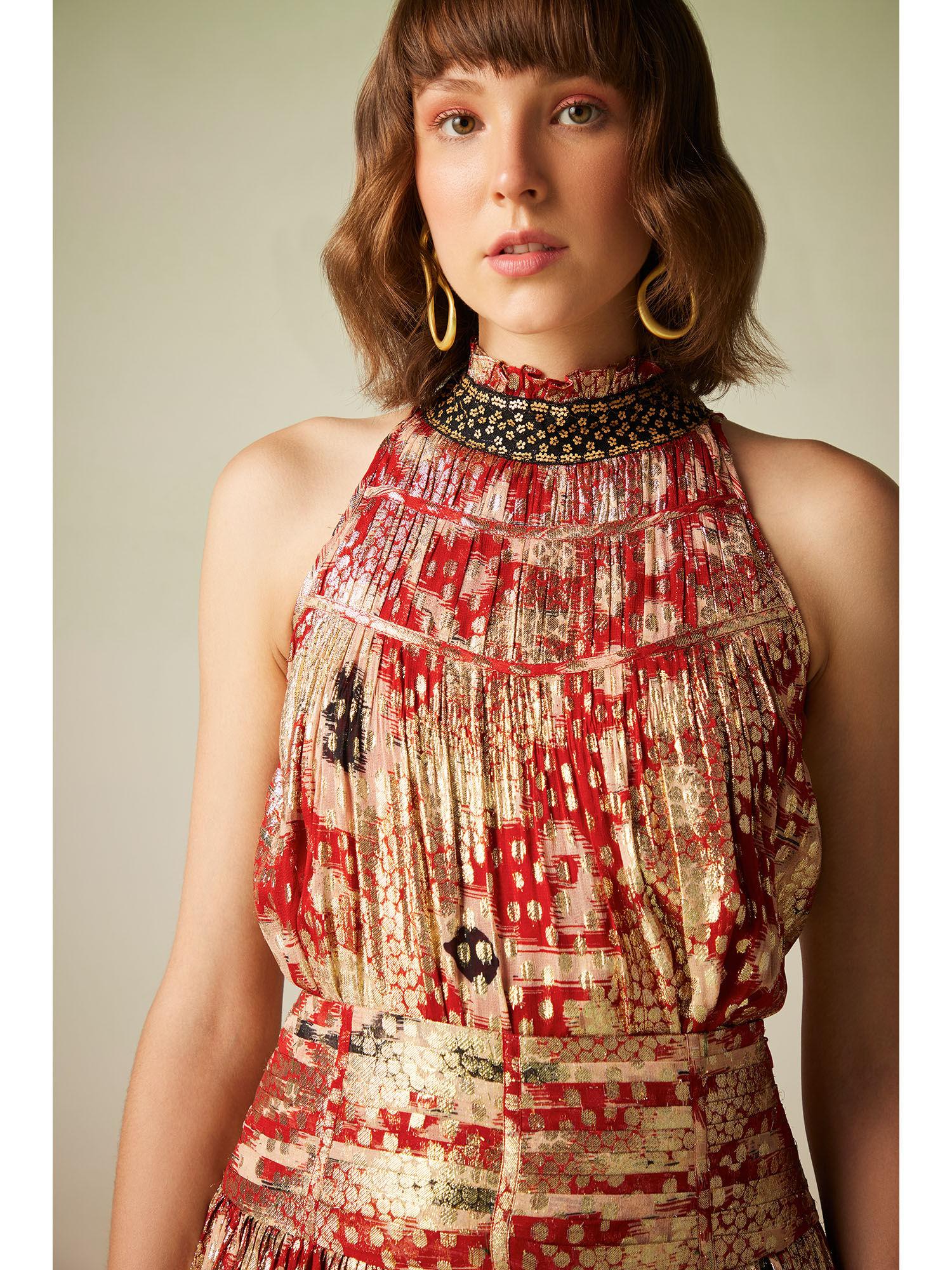 multi-color printed top with lace detailing on neckline