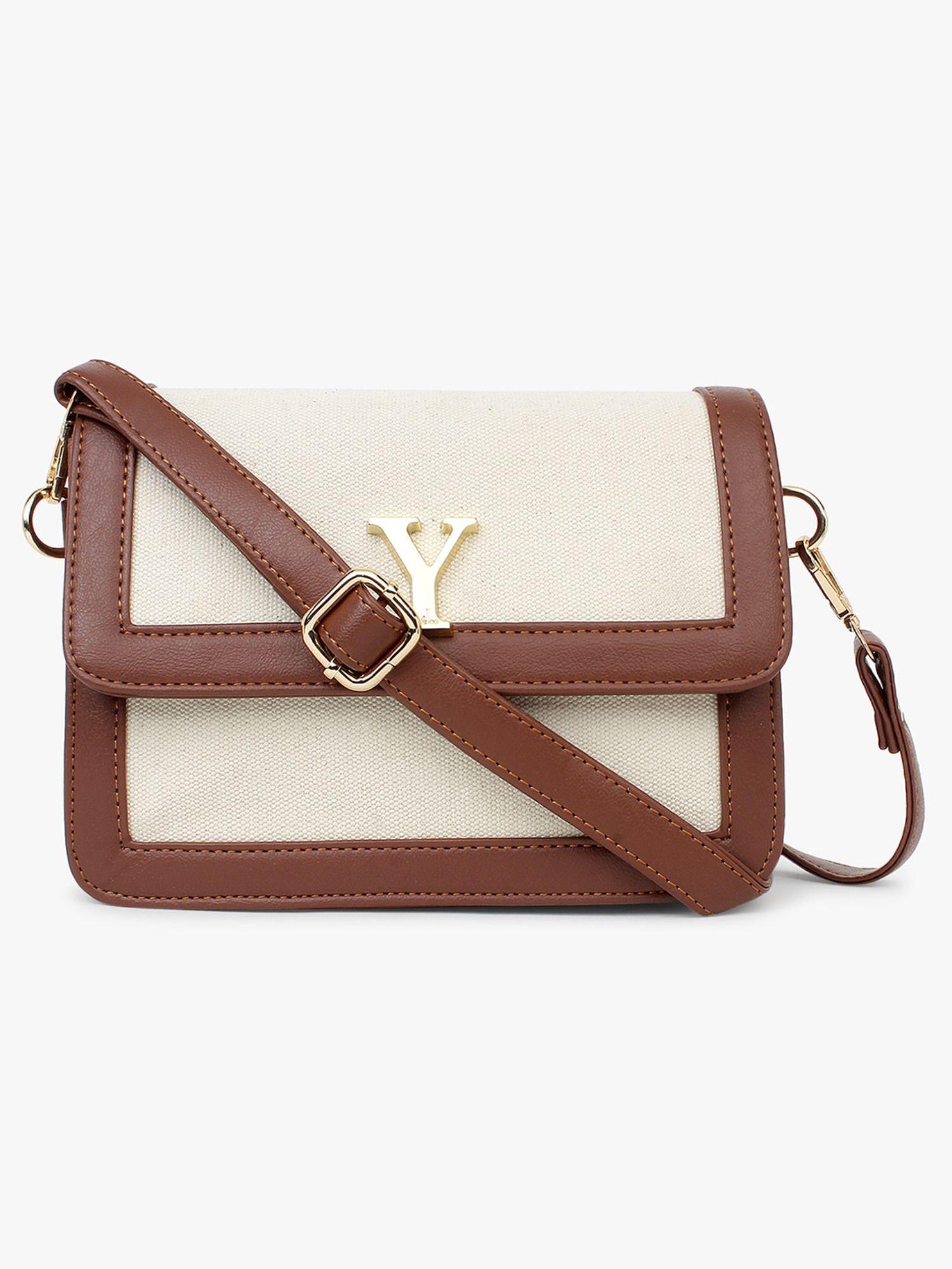 multi compartment sling bag off white tan