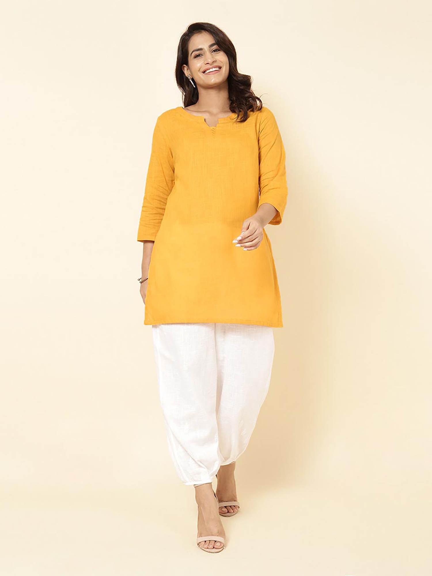 mustard cotton thigh length slim fit short kurti