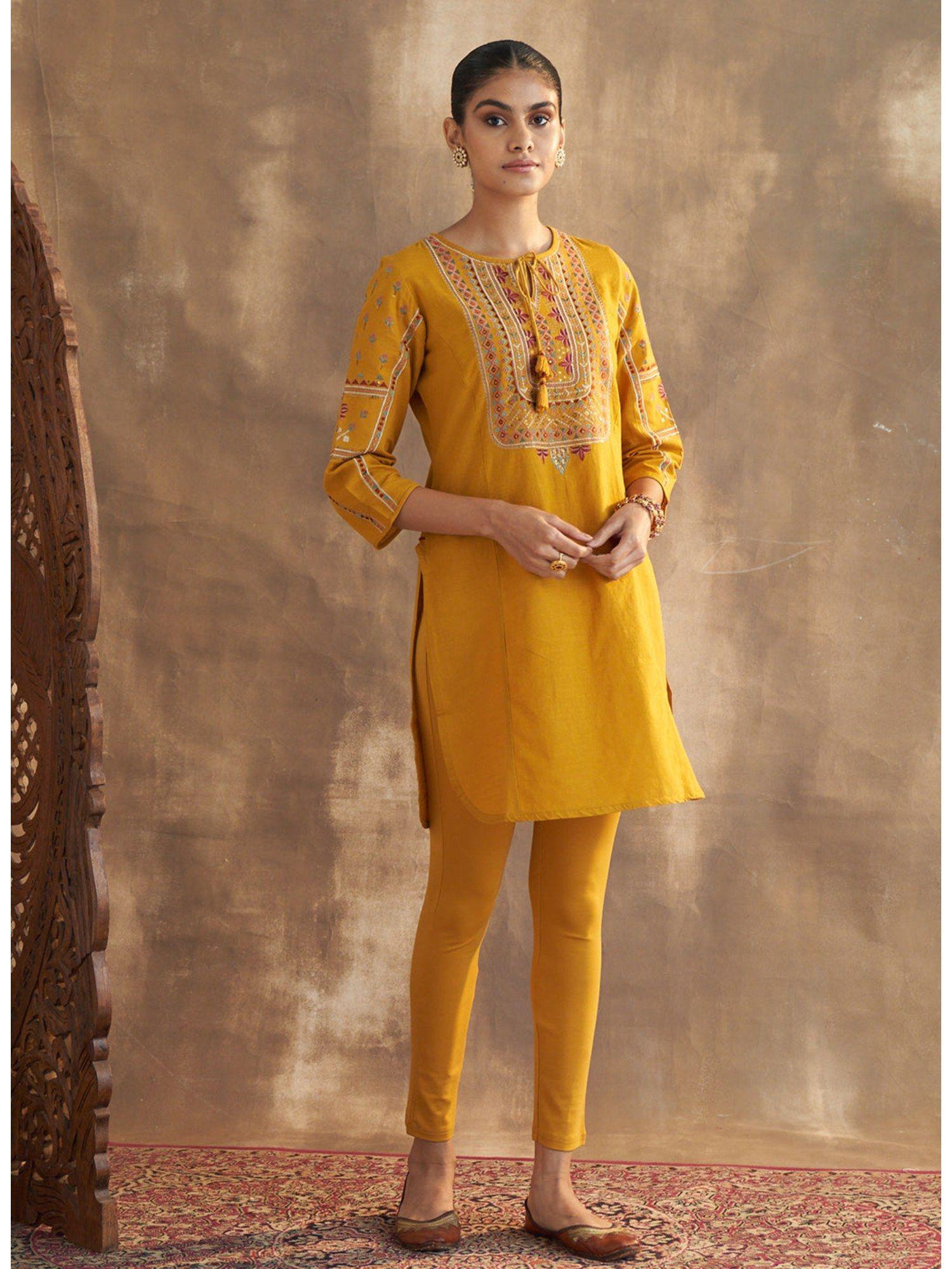 mustard embroidered kurti with ethnic motifs