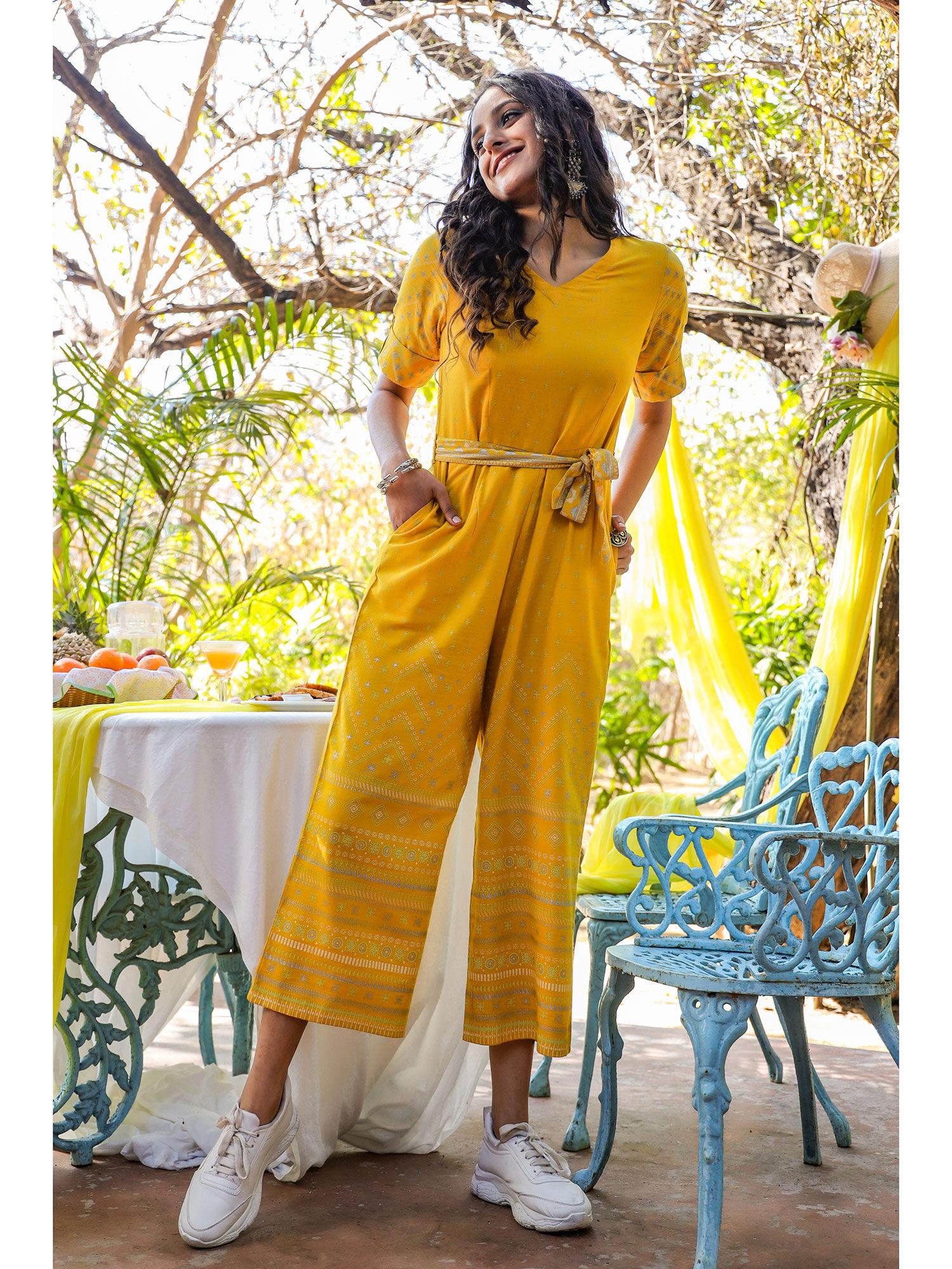 mustard ethnic motif printed rayon flex jumpsuit.