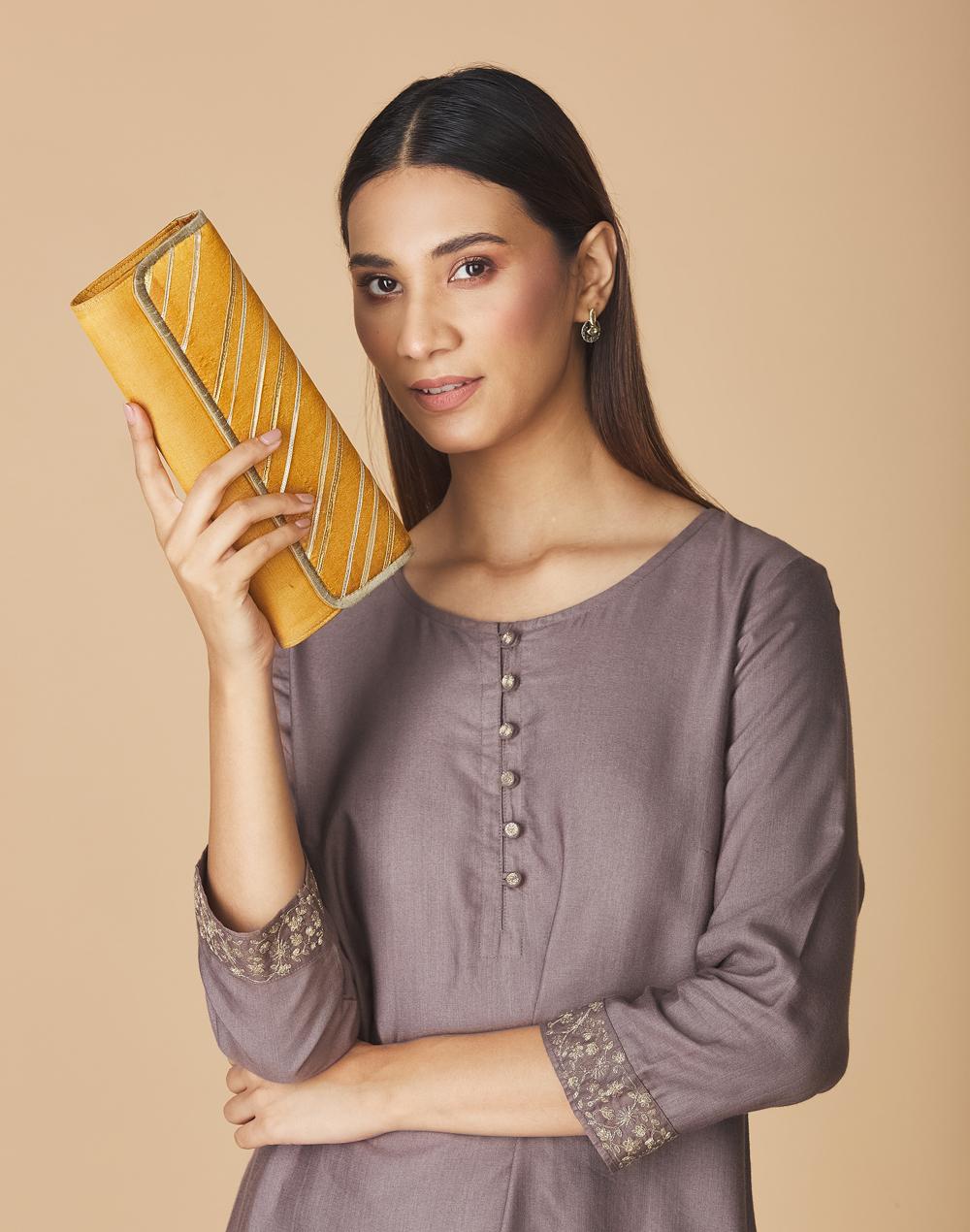 mustard fabric gota patti clutch