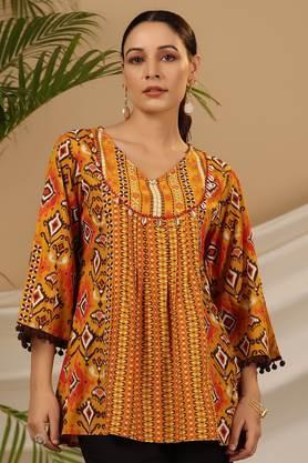 mustard rayon ikat printed a-line lacy tunic with pintucks at works & beadwork - mustard