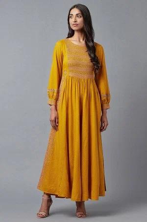 mustard yellow smocked yoke jumpsuit with embroidery