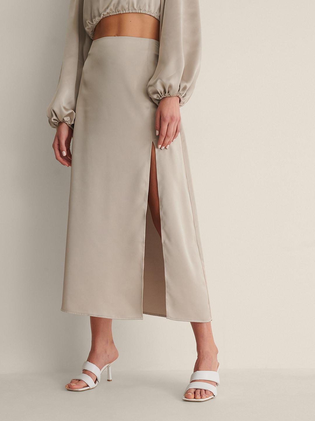 na-kd women beige solid midi satin straight skirt with high slit