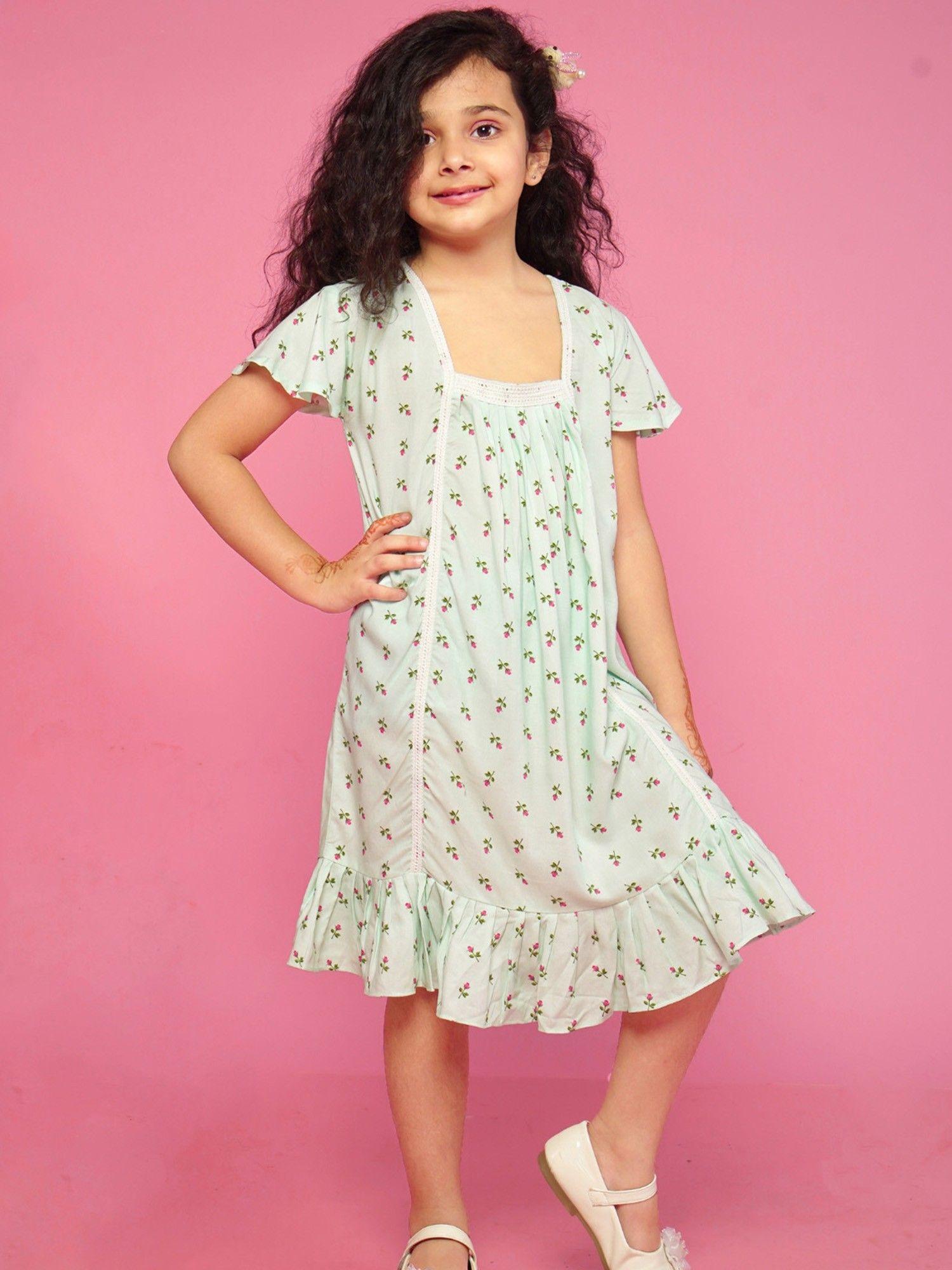 nancy dress in rose print with lace and hem frill green