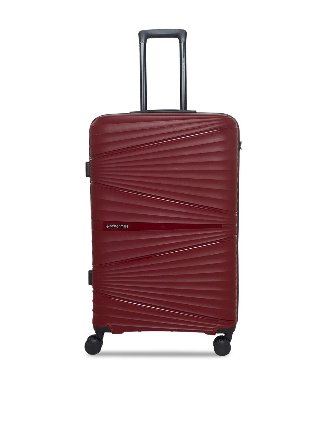 nasher miles maroon textured hard trolley bag