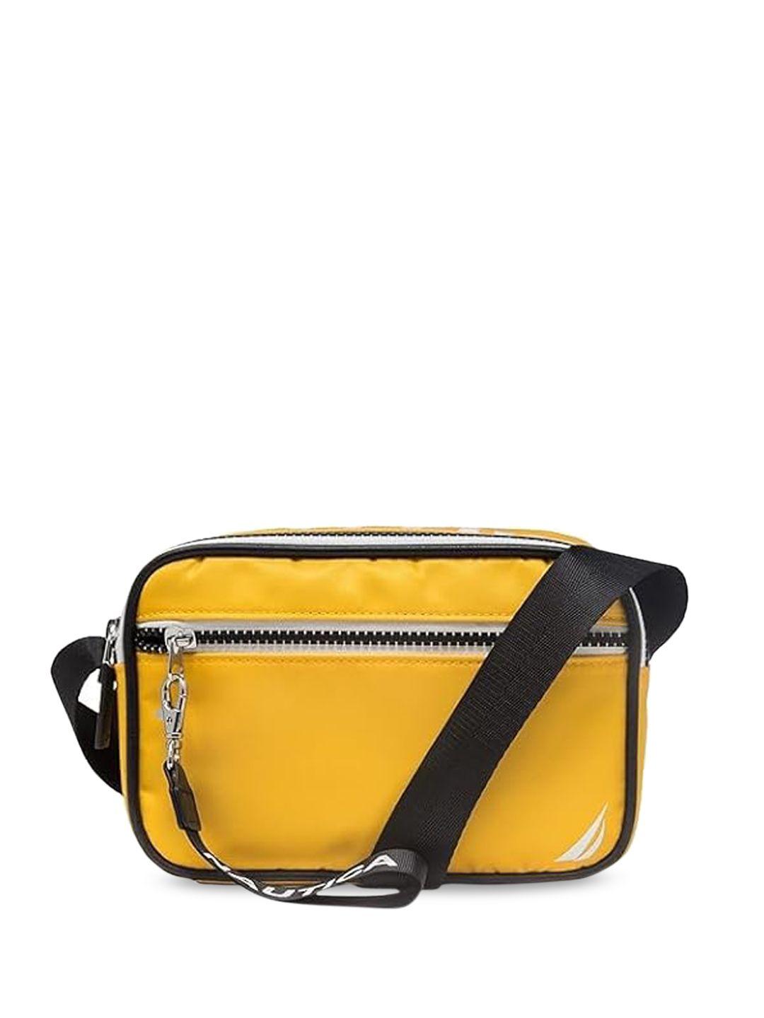nautica structured sling bag with tasselled