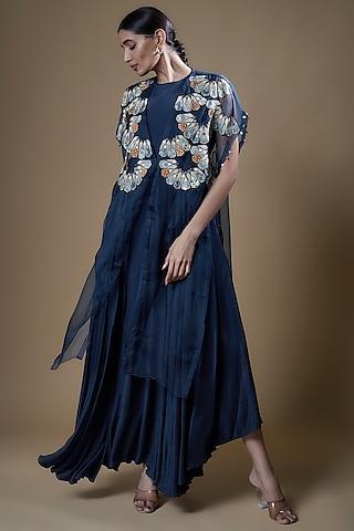 navy blue crepe gown with appliqued cape