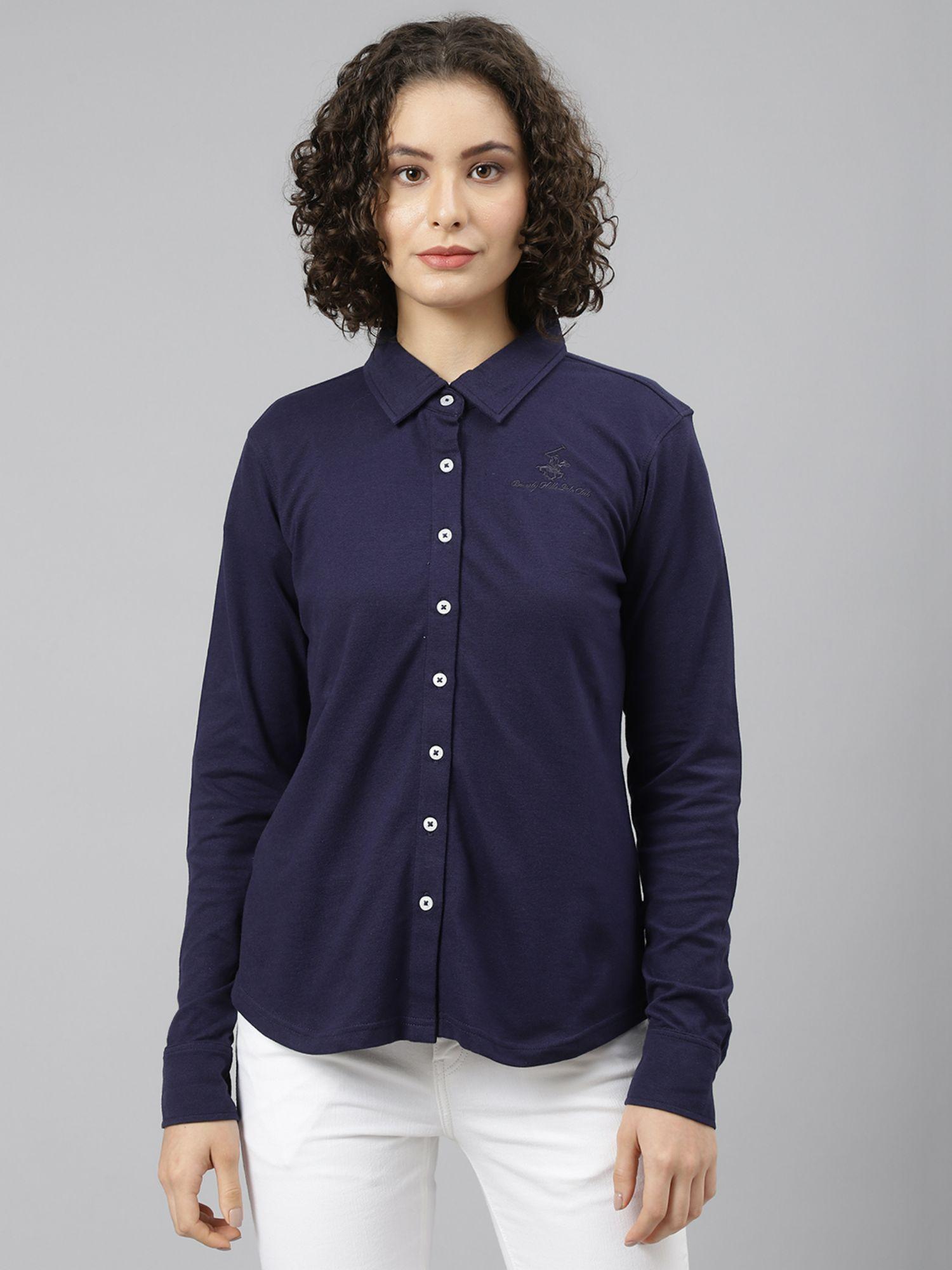 navy blue it's a solid knit shirt