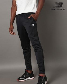 nb tenacity high-rise fitted track pants with insert pockets