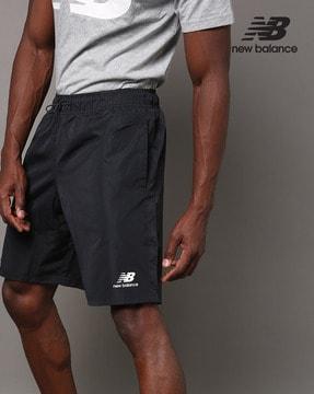 nb athletics high-rise shorts with drawstring waistline