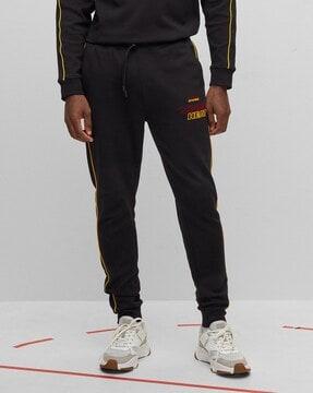 nba collection flock print track pants