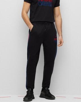 nba collection flock print track pants