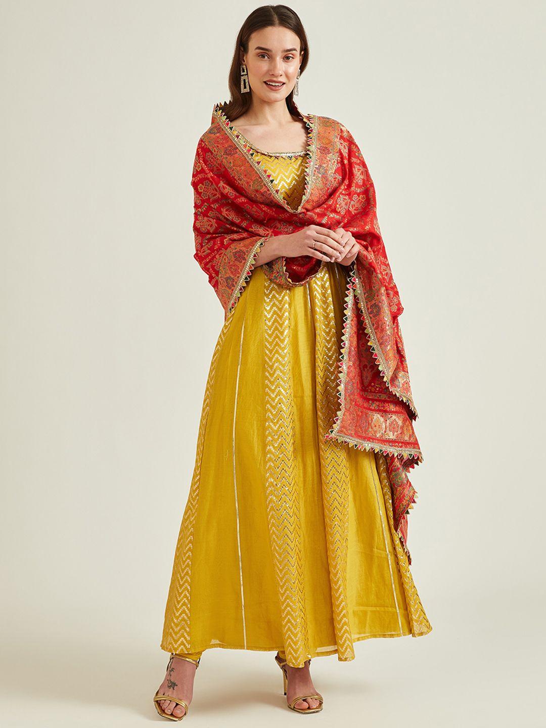 neerus women yellow & red printed pleated chanderi silk kurta with churidar & dupatta