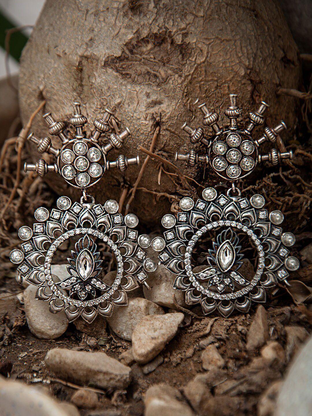 neeta boochra silver-plated contemporary drop earrings