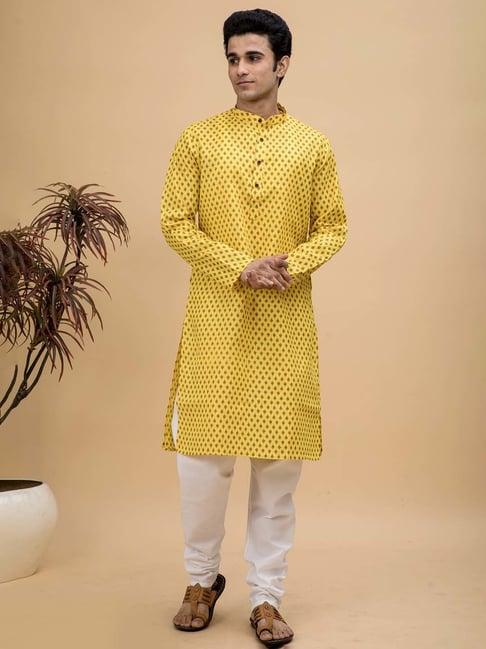 neudis yellow & white regular fit printed kurta & churidar set