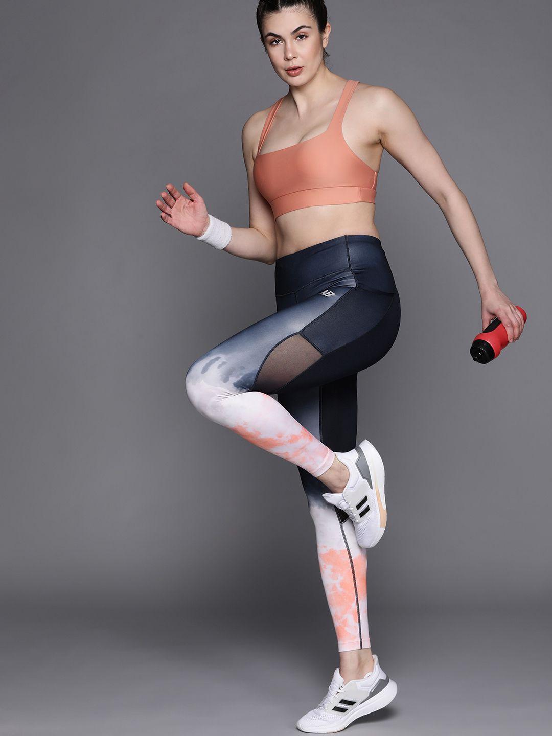 new balance women navy & peach-coloured printed running tights