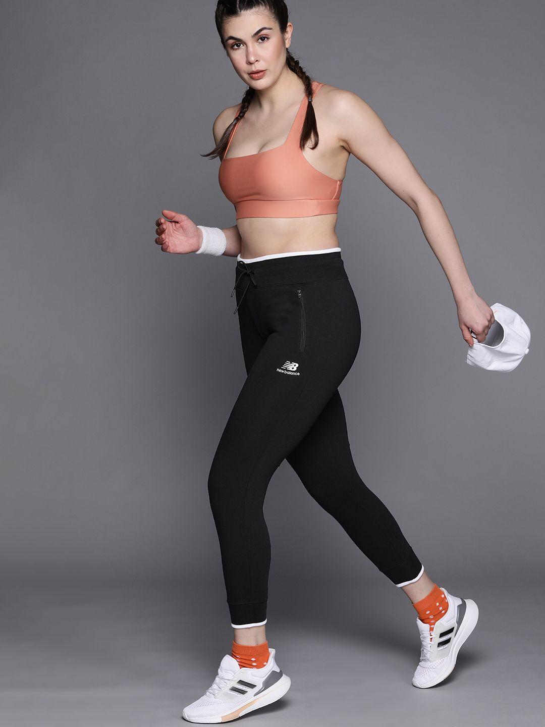 new balance women black solid track pants