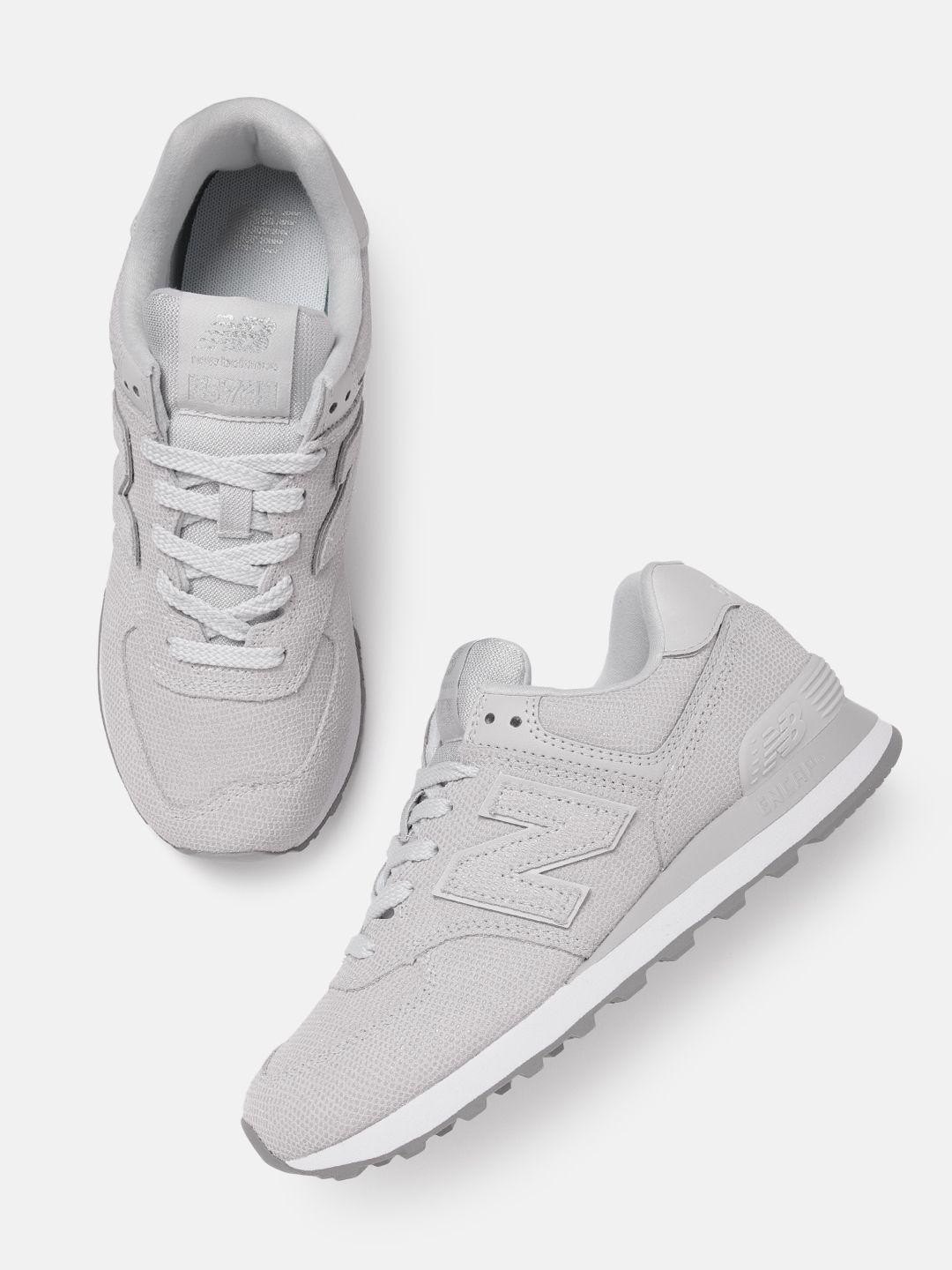 new balance women woven design suede sneakers