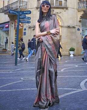 newspaper print saree with lace border