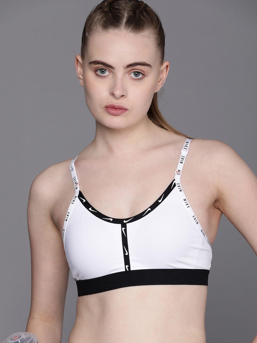 nike brand logo printed lightly padded sports bra with dry fit  technology dr5686-100