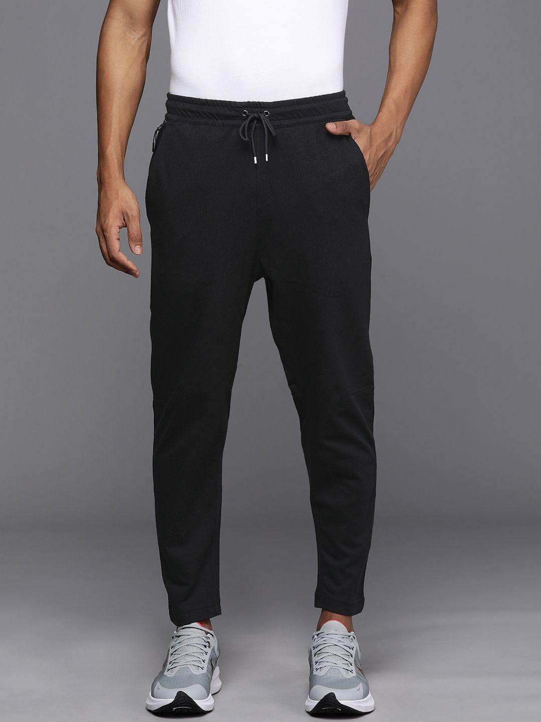 nike men black solid standard fit pure cotton track pants