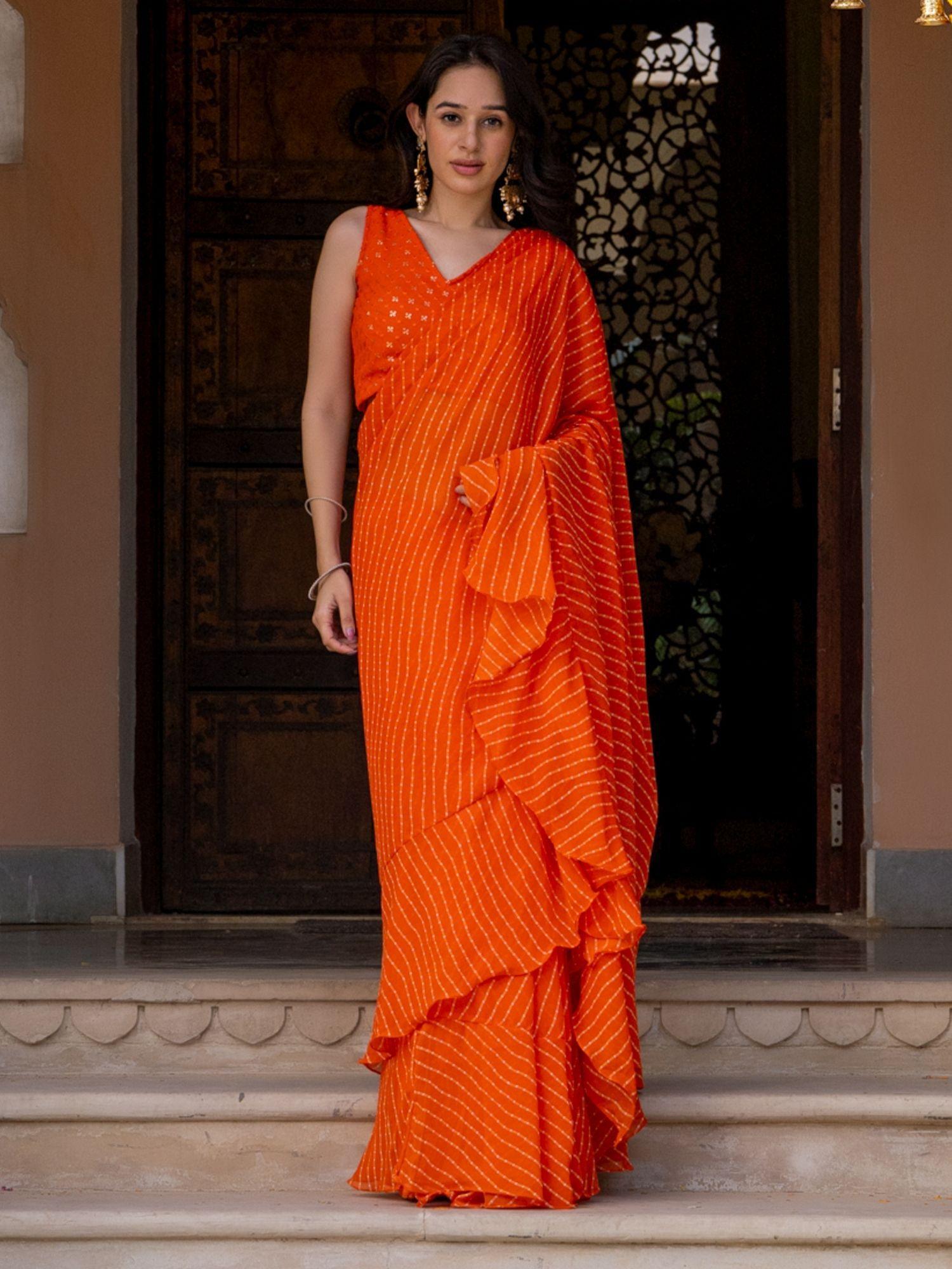 nikhar orange saree with stitched blouse