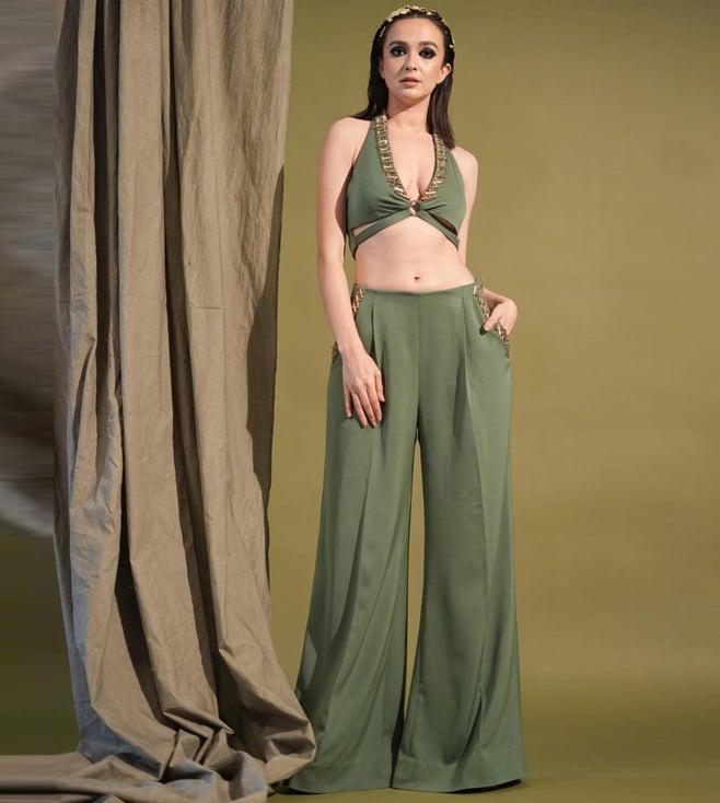 nikita mhaisalkar dark jade green bralette and pant with metallic gold embellishment