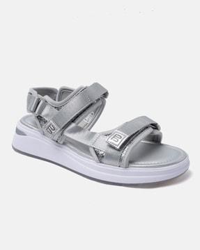 nira dual-strap sandals with velcro closure