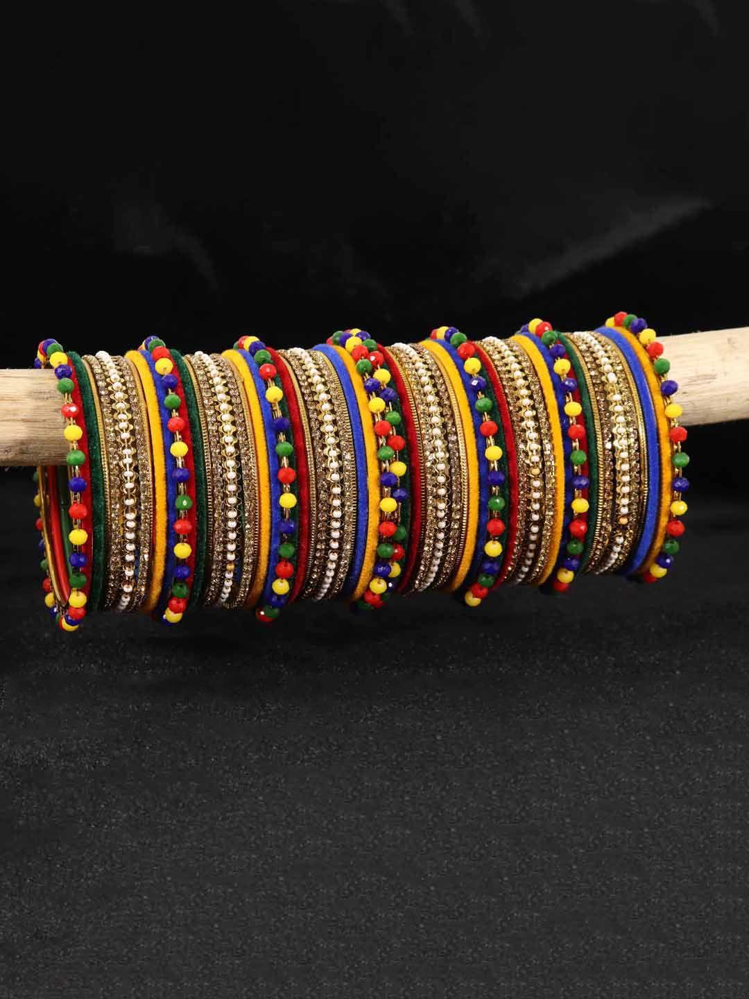 nmii set of 62 gemstone and beads studded velvet bangles