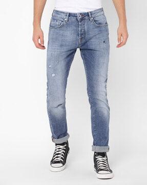 norton carrot mid-wash distressed tapered jeans