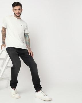 nortonzin mid-wash relaxed jeans