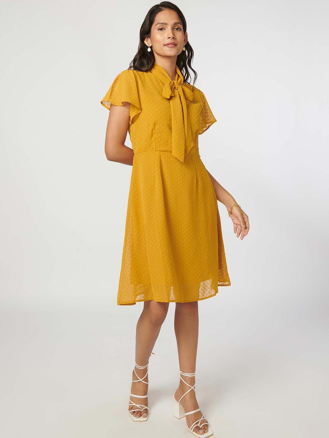 not so pink mustard yellow tie-up neck shirt dress