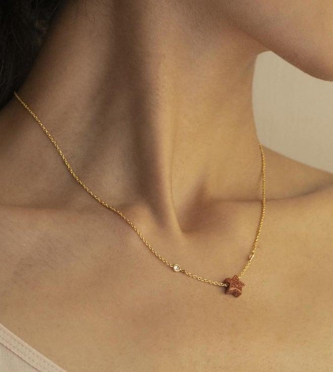 noyra rust marici star necklace