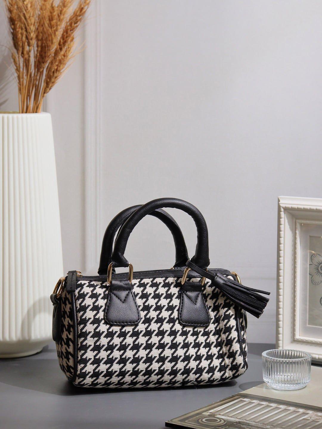 nr by nidhi rathi black geometric handheld bag with tasselled