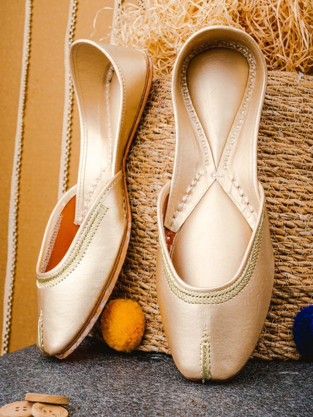 nr by nidhi rathi women gold-toned mojaris flats